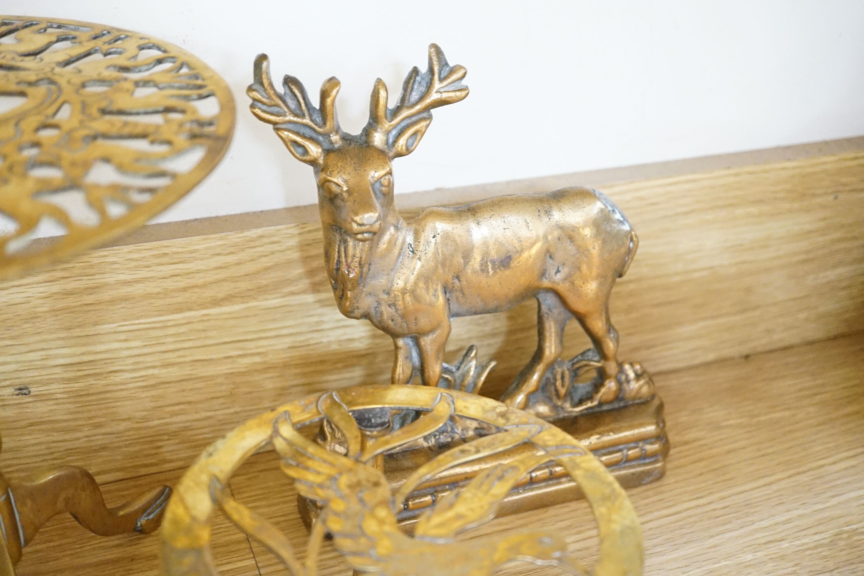 Assorted brass trivets and other brassware